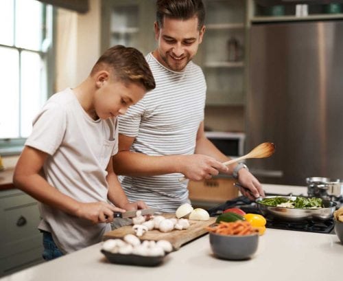 Father and son cooking