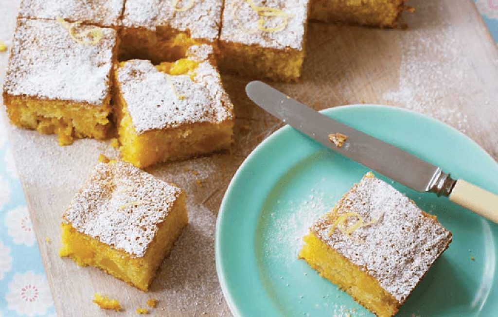 Gluten-free polenta and peach tray cake