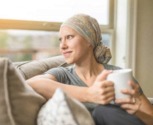 Woman cancer patient with scarf on head