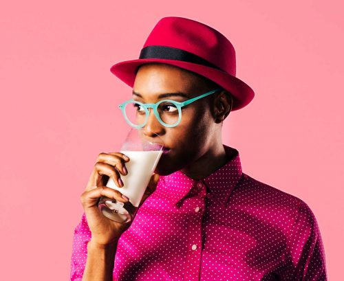 Woman drinking a glass of milk