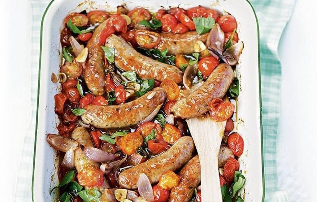 Baked sausages and balsamic tomatoes