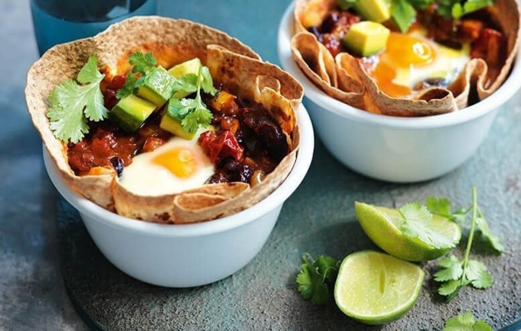 Mexican baked eggs in tortilla baskets