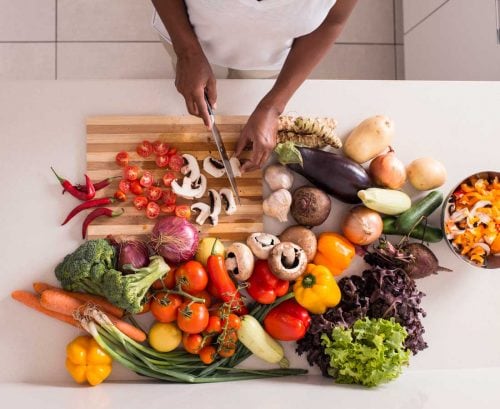 Woman chopping vegetables