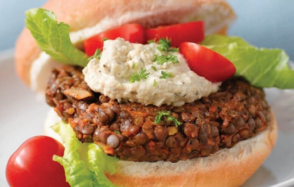 Vegetarian lentil burgers with hummus