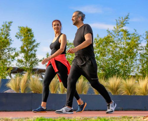Man and woman walking for exercise