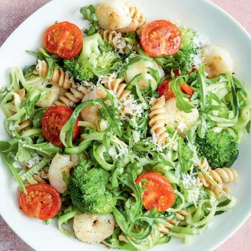 Pasta with garlicky prawns, wilted tomatoes and greens