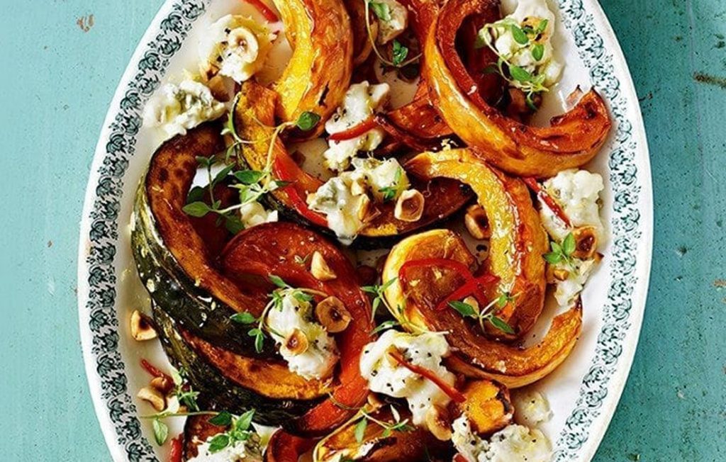 Roasted squash with blue cheese and hazelnuts