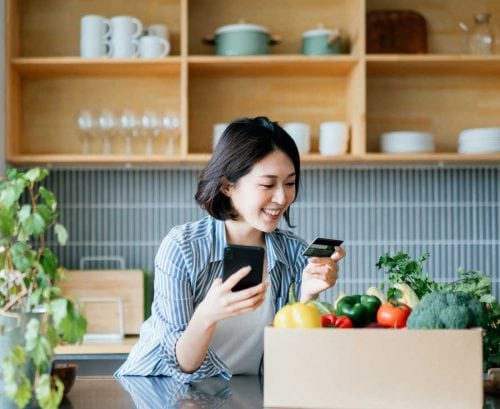 Woman buying groceries online