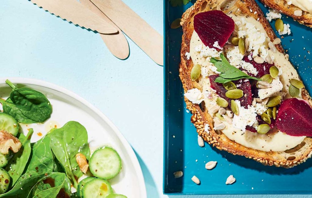 Hummus beetroot and feta bruschetta with spinach salad