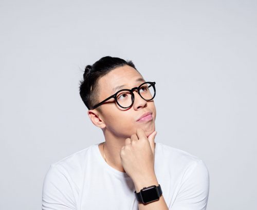 Man pondering difference between coeliac disease and gltuen sensitivity
