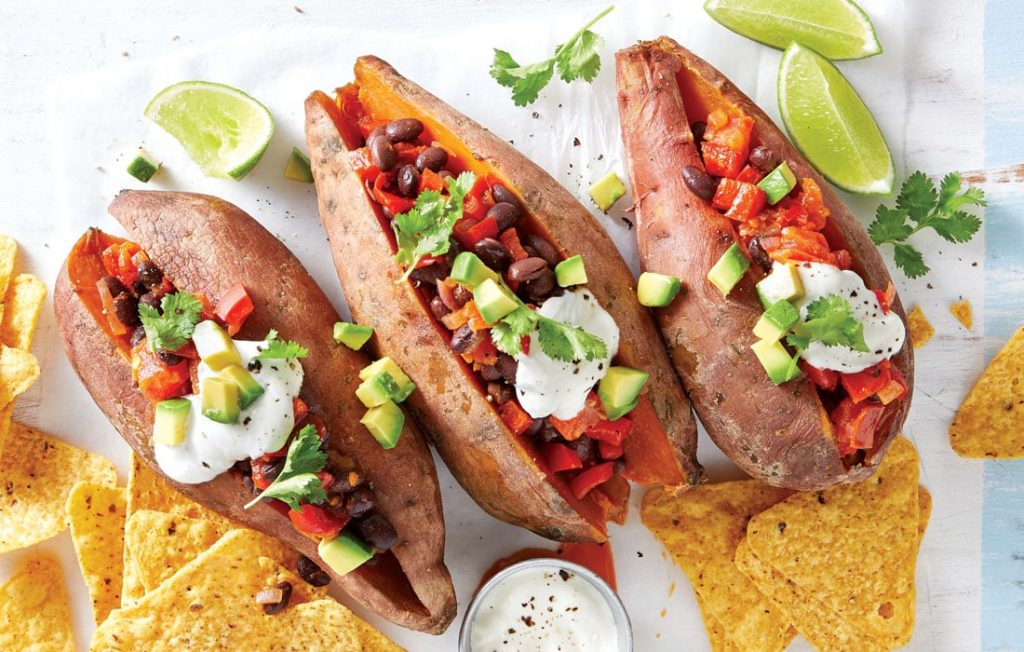 Vegetarian chilli con ‘carne’ sweet potatoes
