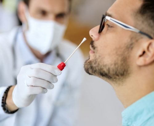 Man getting tested for COVID
