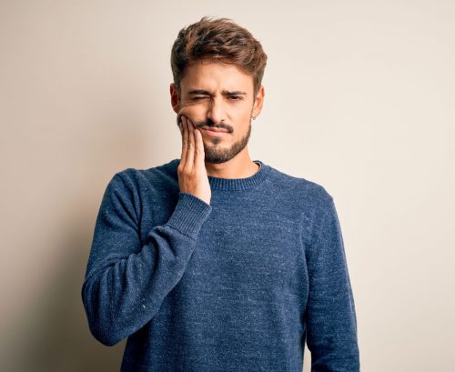 Man with a sore tooth