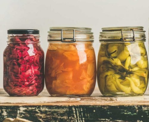 Three jars of fermented vegetables