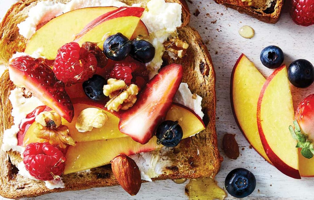 Raisin toast with ricotta, fruit and seeds Raisin toast with ricotta, fruit and seeds