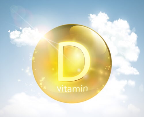 A golden D against a blue sky
