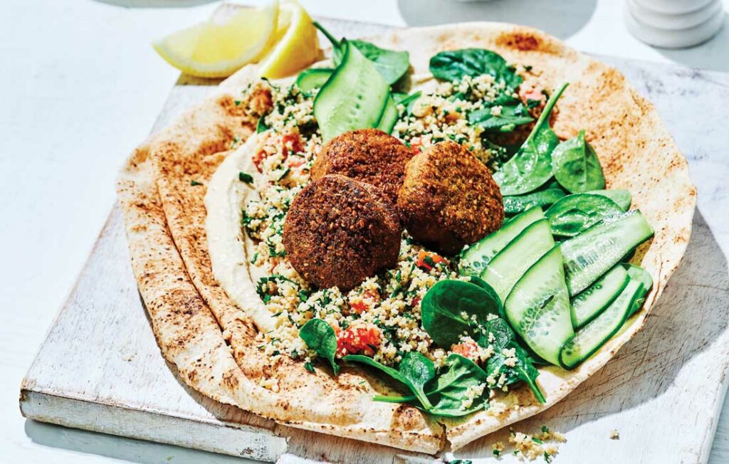 Falafel wraps with hummus and pickled cucumber Falafel wraps with hummus and pickled cucumber