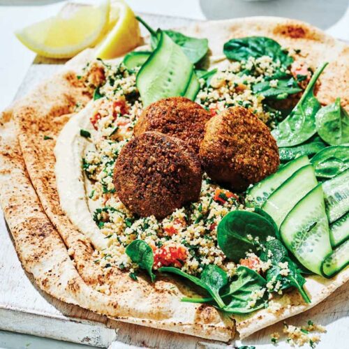Falafel wraps with hummus and pickled cucumber