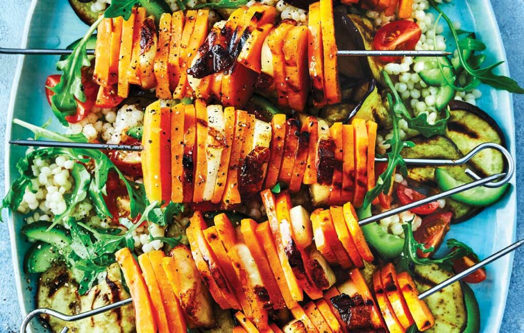 Sweet potato and haloumi skewers with couscous salad