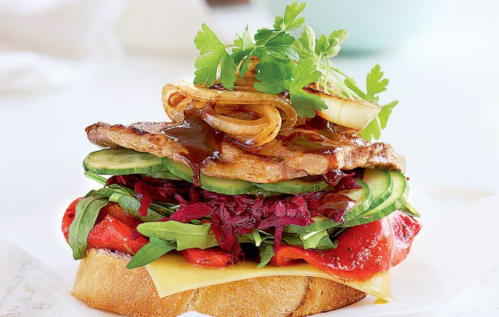 Open smoky steak sandwich with caramelised onions