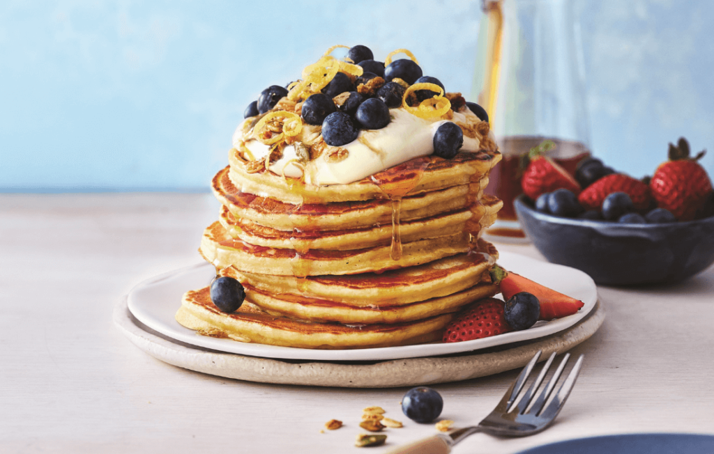 Ricotta pancakes with berries and lemon honey sauce