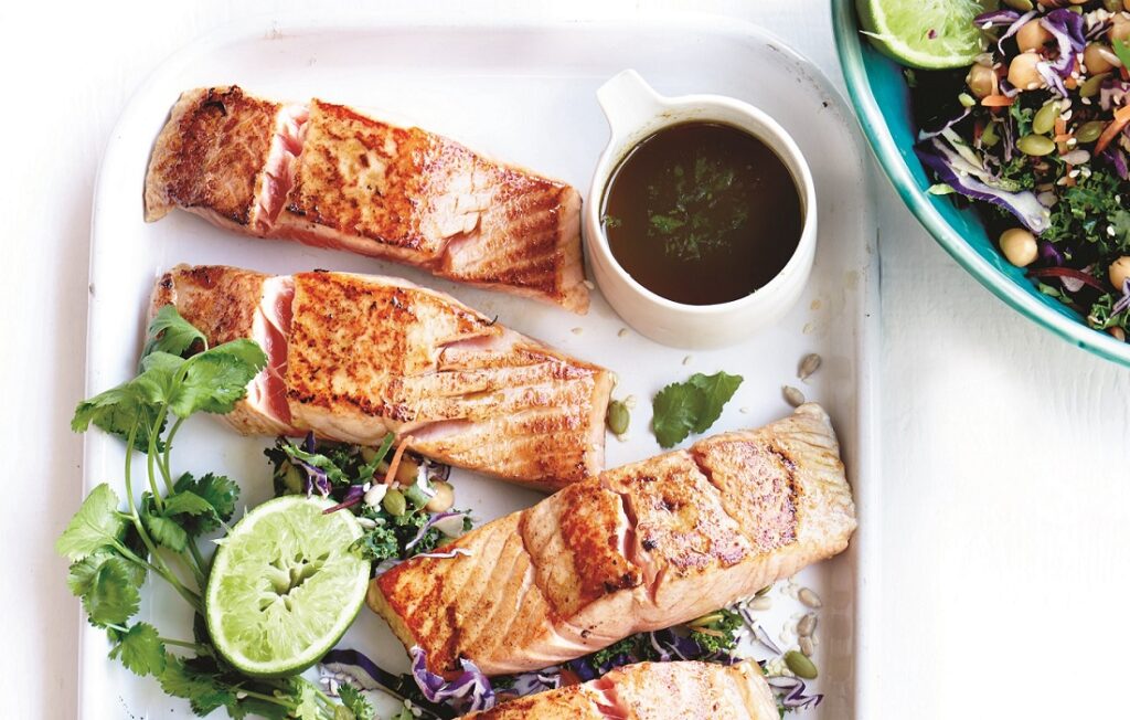 Barbecued salmon and kalesaw with honey and lime dressing