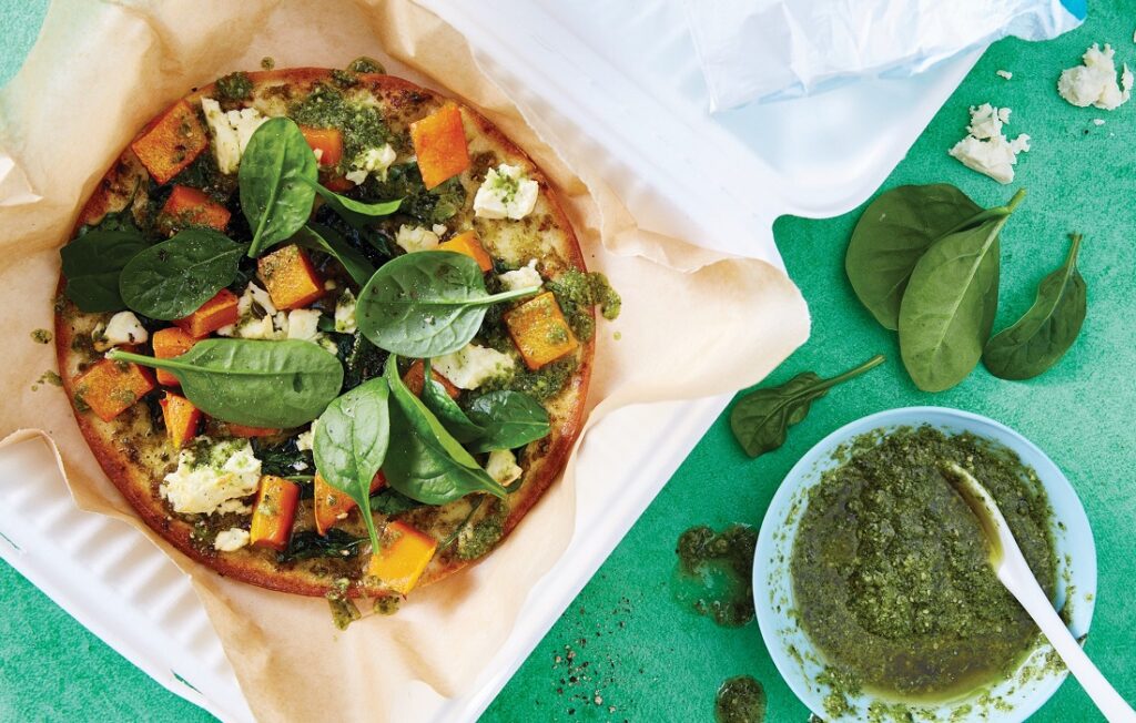 Pesto, roasted pumpkin and baby spinach pizza