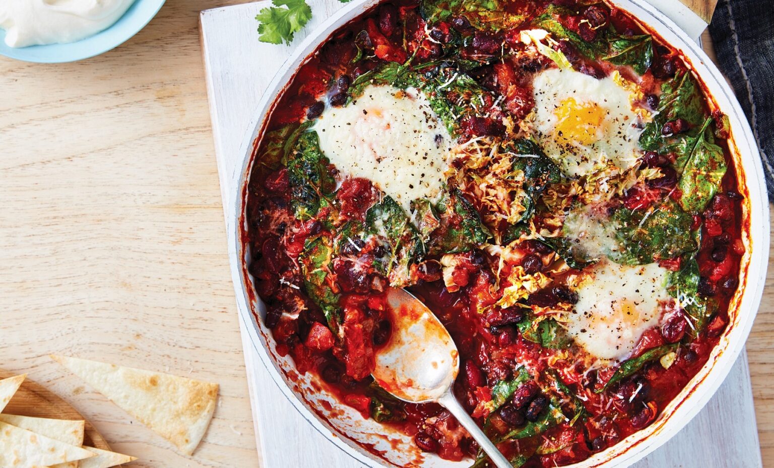 Chipotle bean chilli with baked eggs