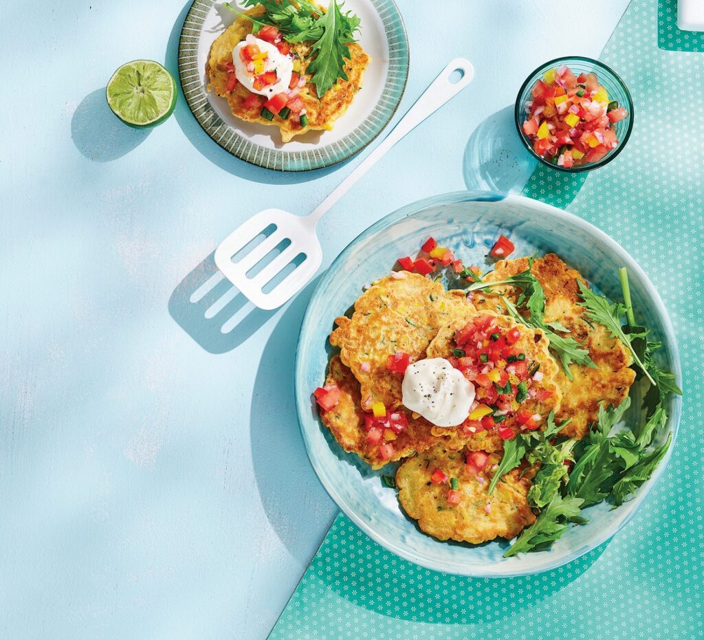 Corn and zucchini fritters with salsa and lime mayo