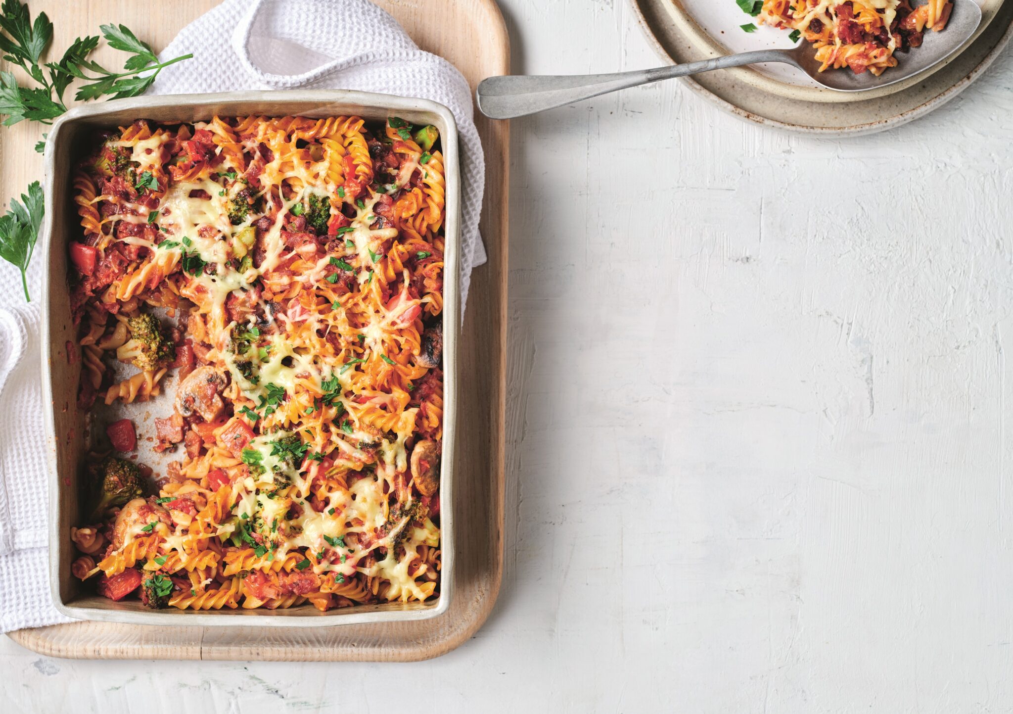 Creamy tomato, bacon and mushroom pasta bake