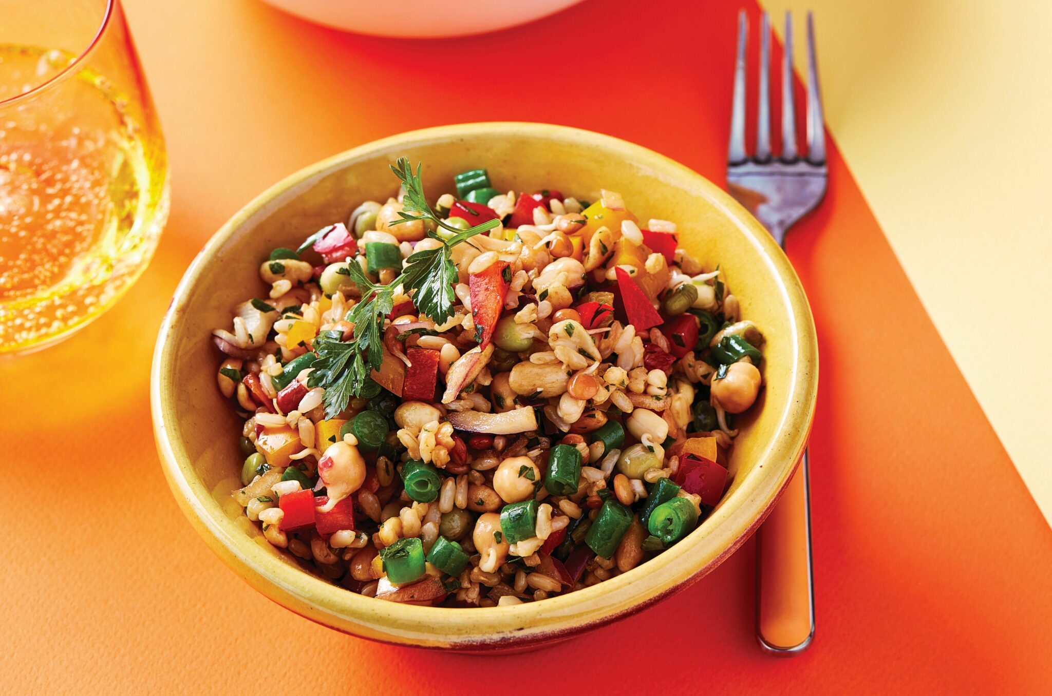 Brown rice salad with sesame dressing and roasted nuts
