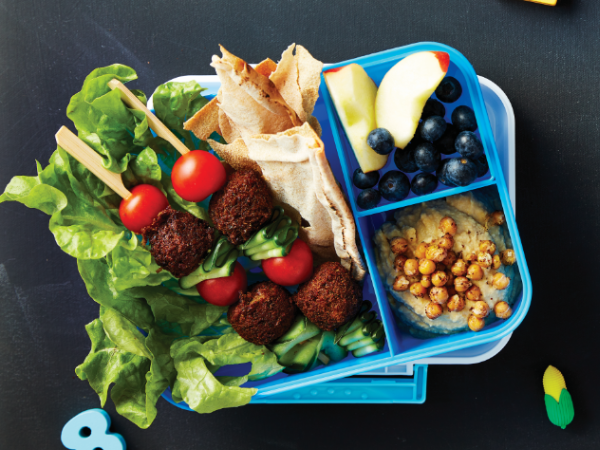 Falafel kebabs with pita chips, hummus and fruit Falafel kebabs with pita chips, hummus and fruit