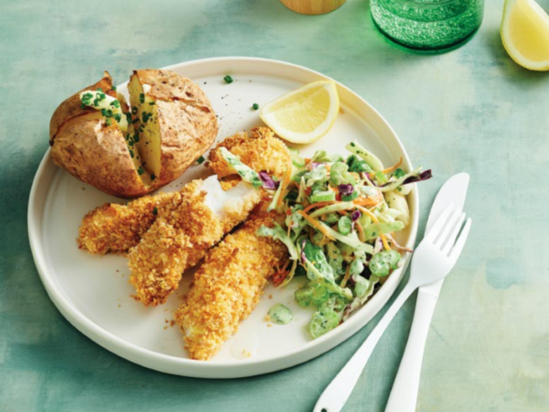 Crumbed fish with creamy slaw and baked potatoes