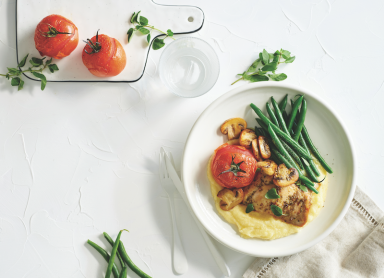 Oregano chicken and mushrooms on creamy polenta