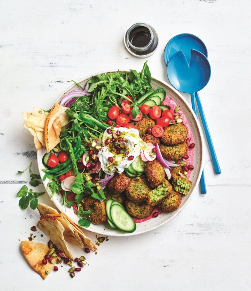 Falafel salad with beetroot hummus and tzatziki Falafel salad