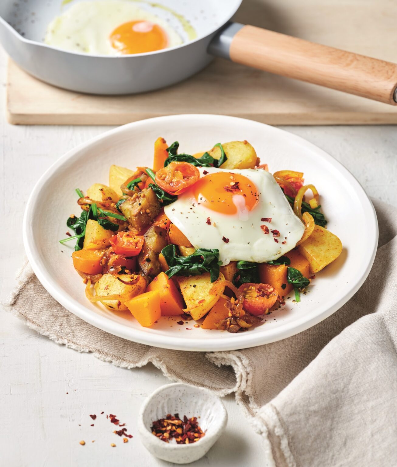 Indian-spiced bubble and squeak with fried eggs