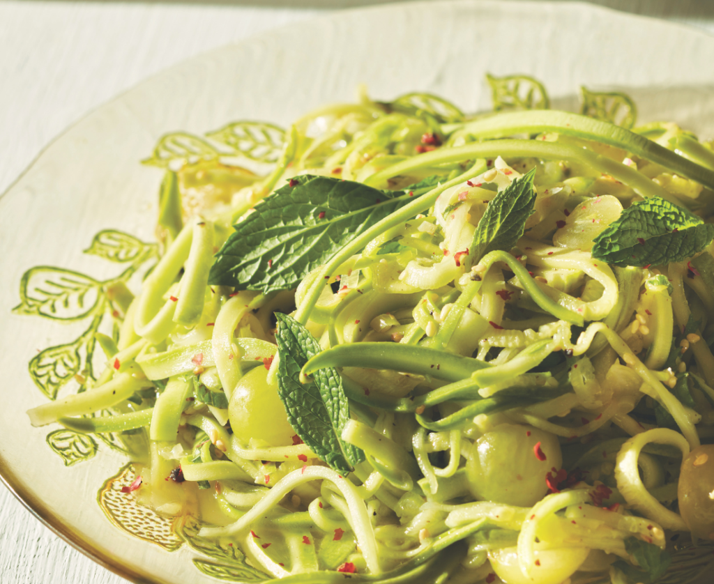 Courgette salad with grapes, mint and sesame seeds