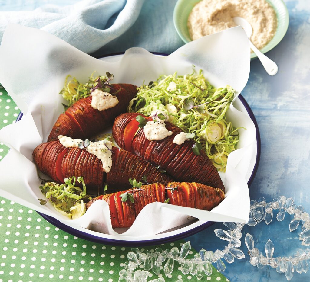 Hasselback sweet potatoes with vegan cheese sauce Hasselback sweet potatoes with vegan cheese sauce