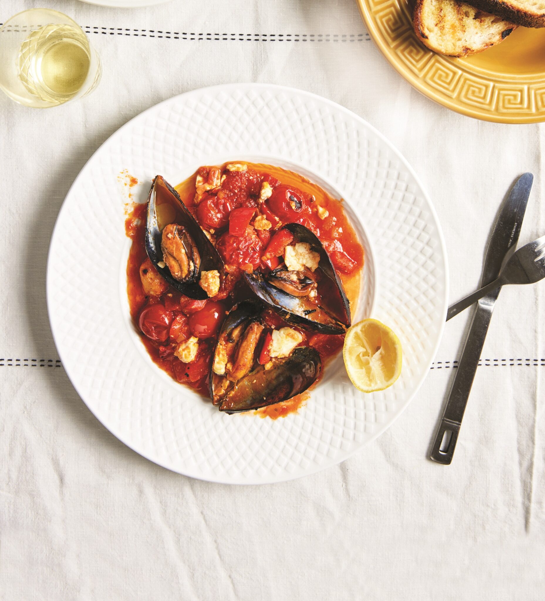 Mussel saganaki with red peppers (capsicum)